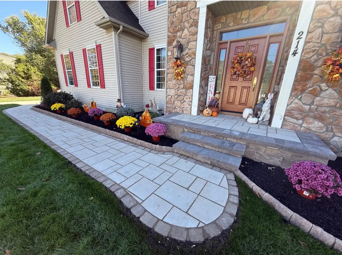 Complete backyard hardscape with patio, walkway, and retaining wall