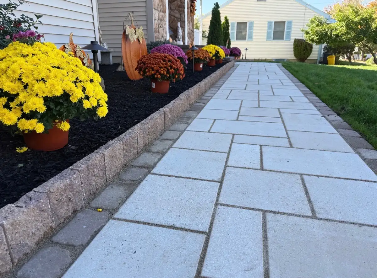 Outdoor living space with paver patio and fire pit