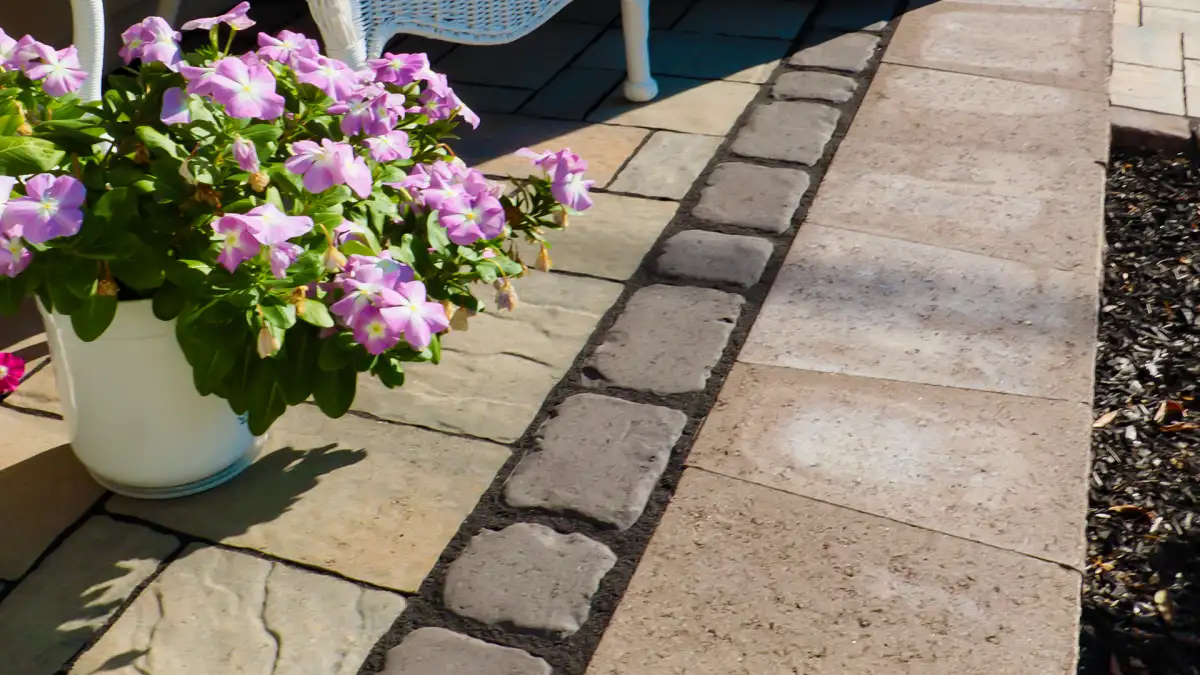 Retaining wall detail with natural stone cap