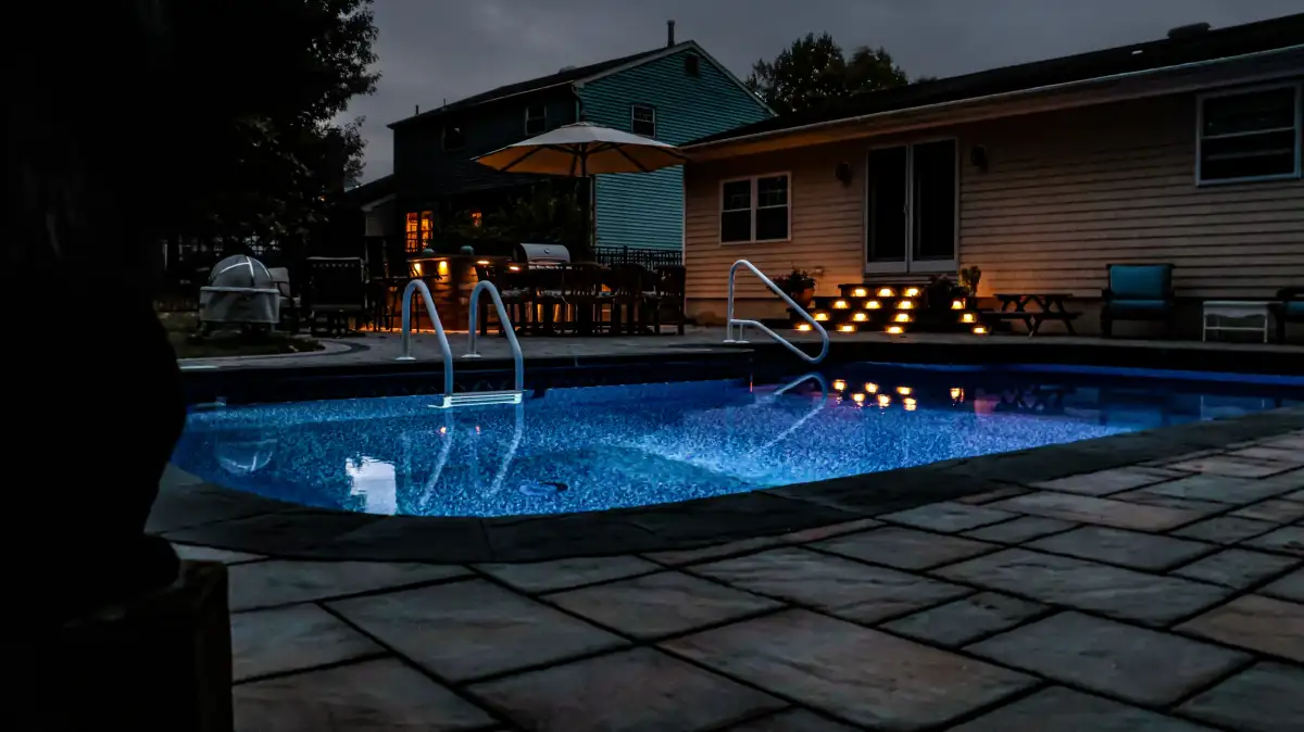 Paver patio with pergola and outdoor dining space