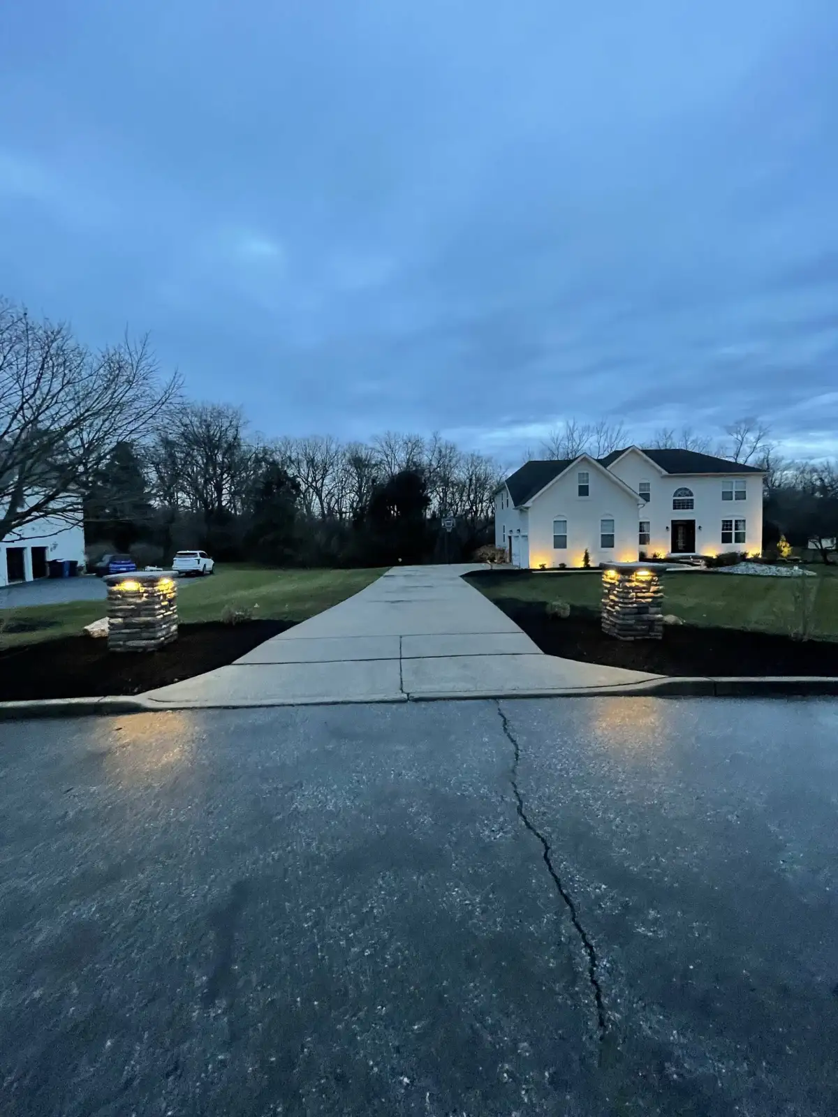Curved garden bed with seasonal color plantings