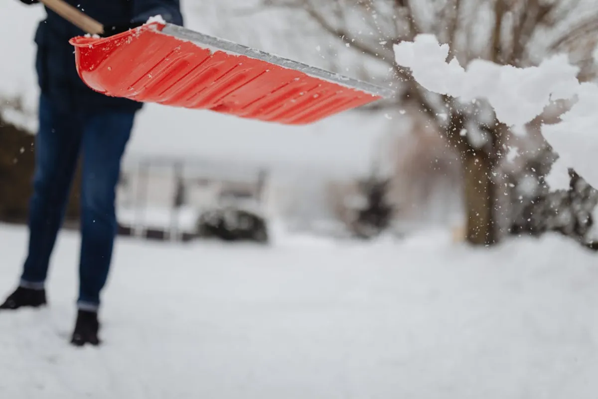 Shoveling snow from a commercial walkway